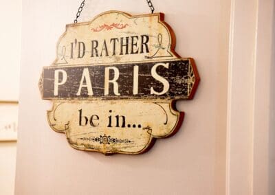 Rustic sign at Charter Senior Living of Paris in Paris, TN reading 'I’d rather be in Paris